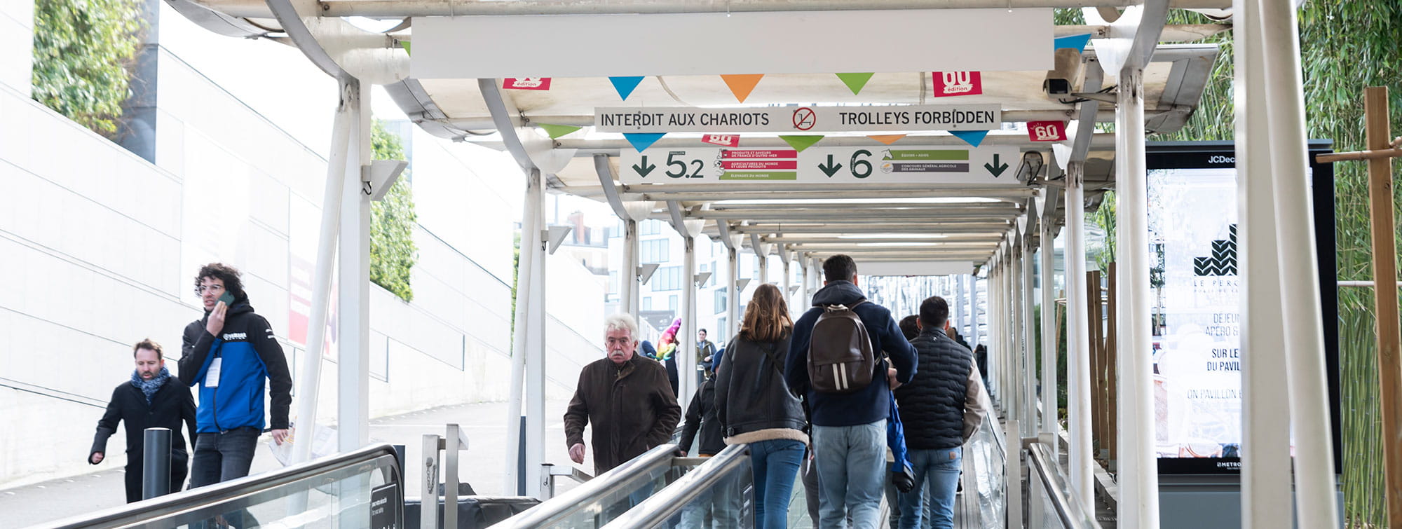 Visitors on the escalators at the outside entrance